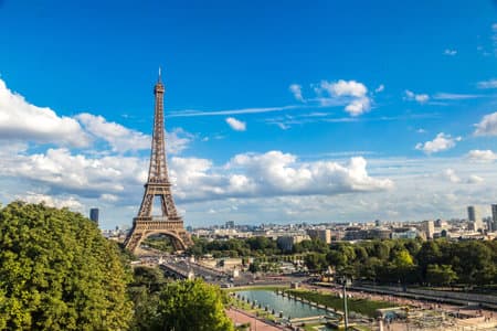 Aerial view of the Eiffel Tower in Paris, France in a beautiful summer day