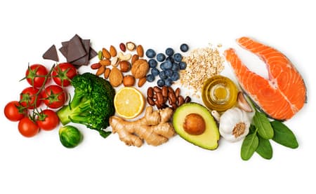 Selection of healthy food on white background. Healthy diet foods for heart cholesterol and diabetes.