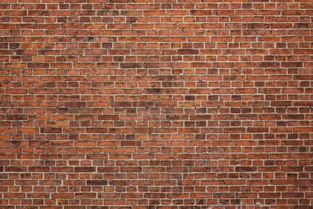Grunge red brick wall background with copy space